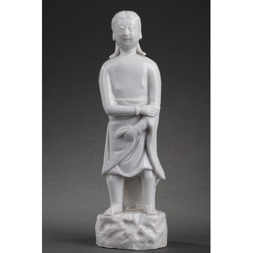 Standing figure of a man traditionally called Adam in Blanc de Chine porcelain